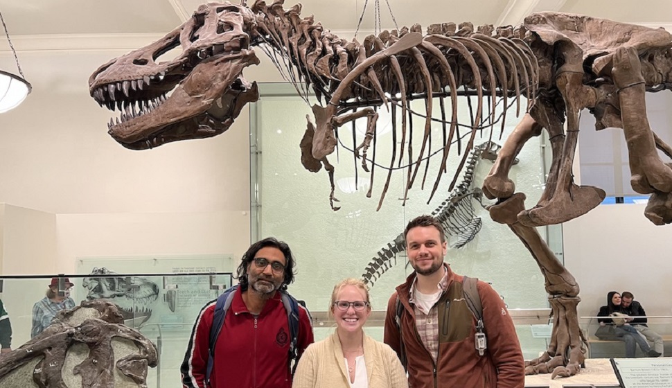 Researchers with dinosaur bones