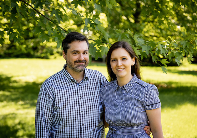 Ilias and Jelena in a sunny park. 