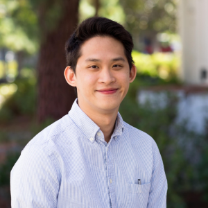 William headshot in a light blue shirt